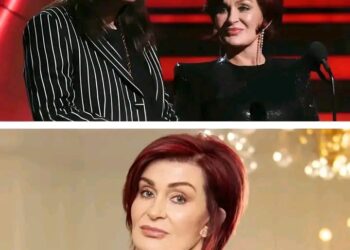 Sharon Osbourne stands out as a compelling and often divisive figure in the entertainment industry, known for her bold personality, sharp wit, and multifaceted career. While she initially gained recognition as the wife and manager of rock icon Ozzy Osbourne, it was her own unapologetic charm and tough-minded approach that turned her into a star. Her breakthrough came with *The Osbournes* in 2002, a groundbreaking reality TV show that offered an unfiltered look at her family’s chaotic, humorous life. Sharon’s frankness and biting humor made her a standout presence, and the show quickly became a pop culture sensation.  Before her television fame, Sharon had already proven her talents behind the scenes. She played a critical role in shaping Ozzy’s solo career, helping him rebuild after his departure from Black Sabbath and navigating him through personal and professional challenges. Her combination of business acumen and fierce loyalty made her a powerhouse in music management, earning respect even in the male-dominated world of rock…